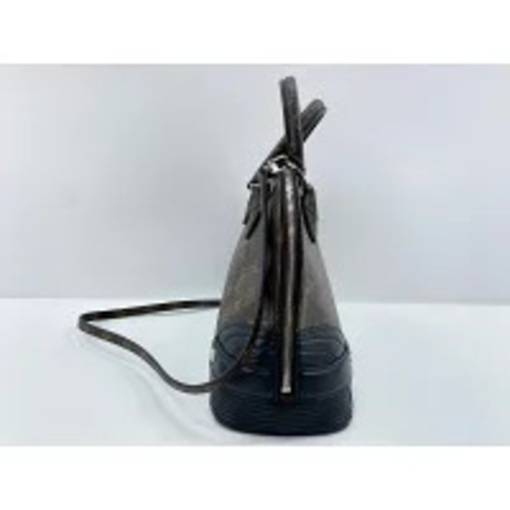 Louis Vuitton Alma Handbag Brown